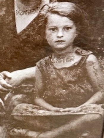 Mira, labelled SISTER, in the Bick family's 1936 forest photograph